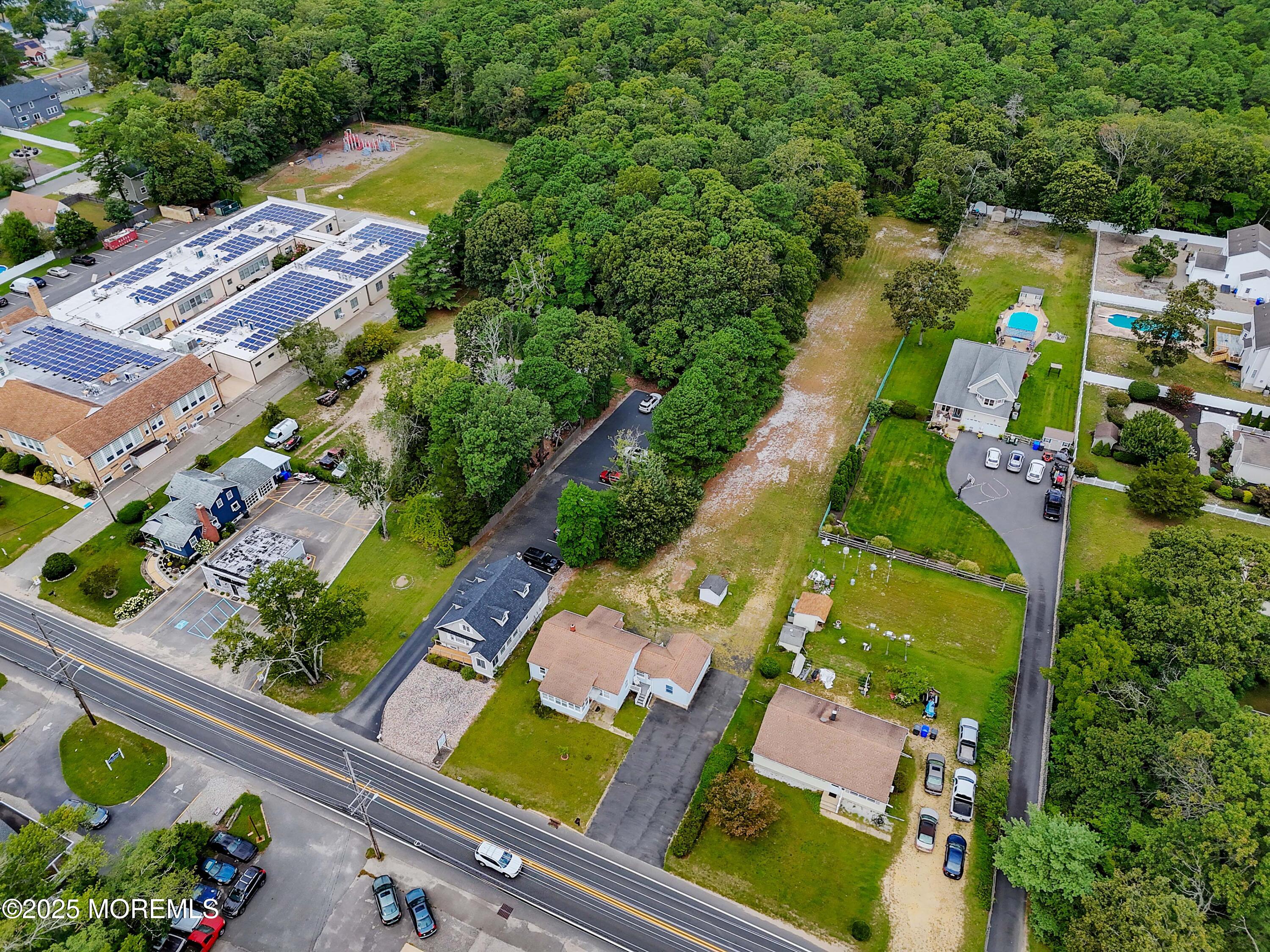 230 Drum Point Road Brick, NJ 08723 - Photo 25 of 31 an aerial view of residential houses with outdoor space