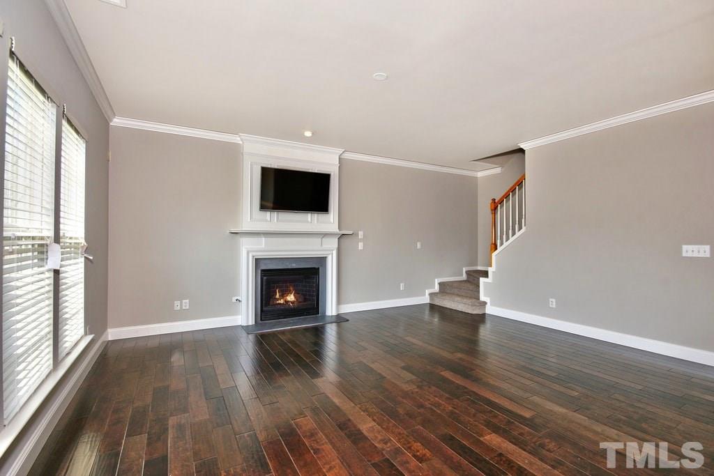 5307 Griffith Park Road Raleigh, NC 27613 - Photo 13 of 25 Gather around the fireplace when it's chilly and enjoy a great movie!