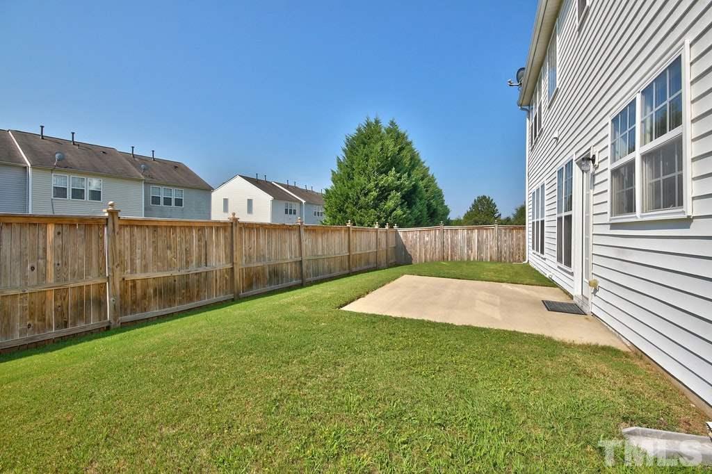 5307 Griffith Park Road Raleigh, NC 27613 - Photo 25 of 25 Another view of the back yard. This community includes tennis courts, a very large in ground swimming pool, fitness center in the Clubhouse and playground. Very friendly community! Welcome home!