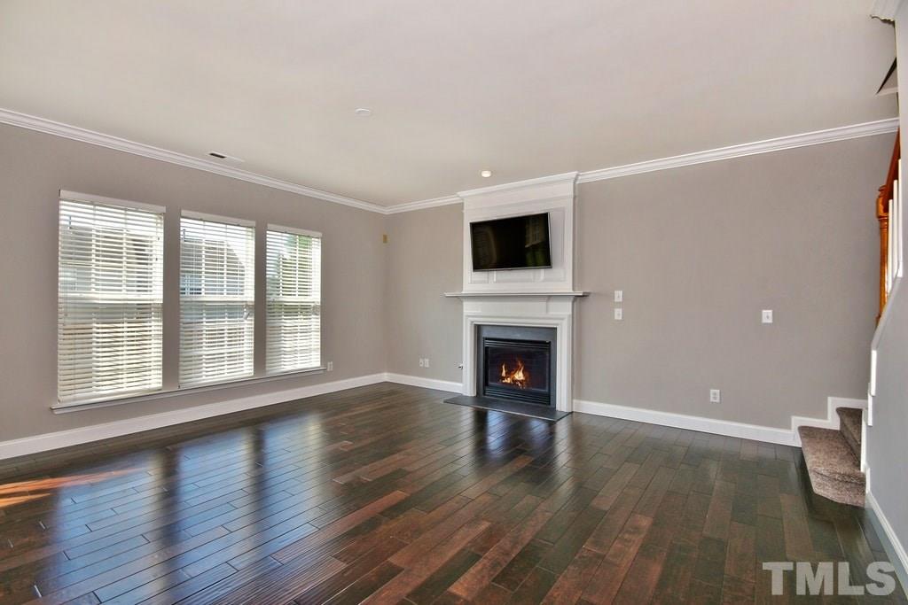 5307 Griffith Park Road Raleigh, NC 27613 - Photo 10 of 25 Spacious family room with gas fireplace and mantel. Perfect for showing off your family pictures!