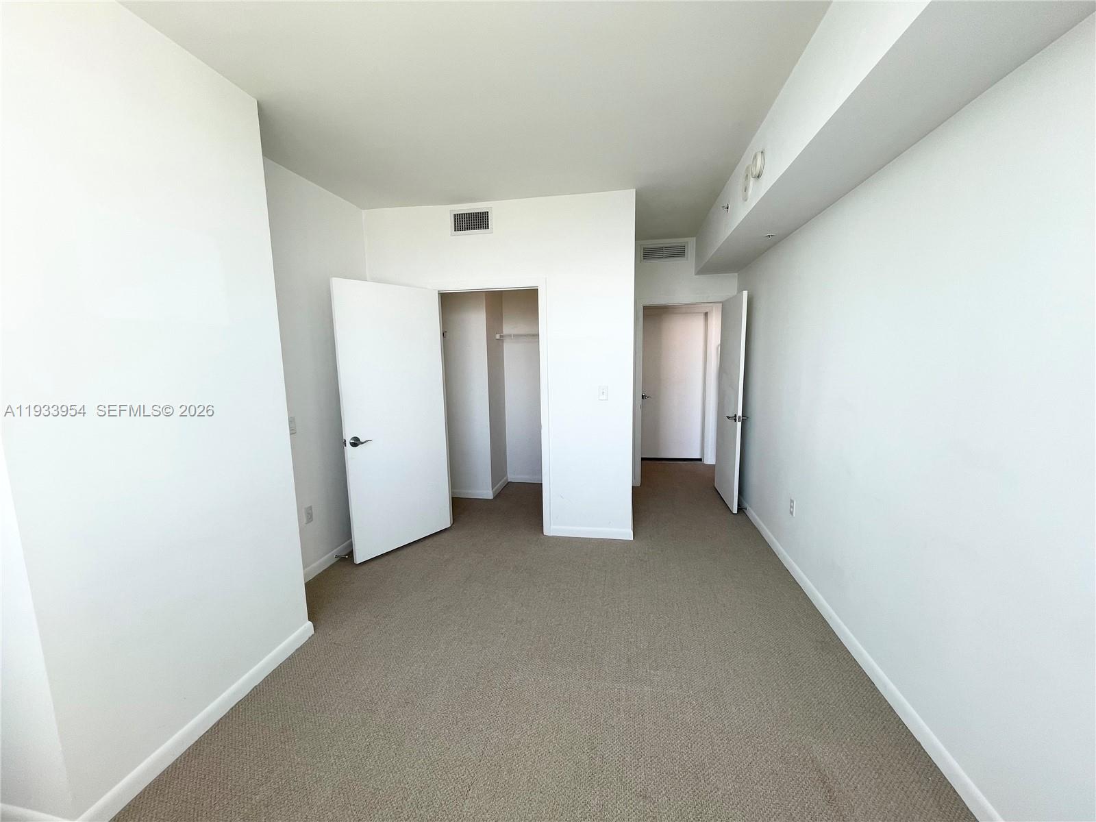 253 Northeast 2nd Street, Unit 2409 Miami, FL 33132 - Photo 30 of 61 a view of a hallway