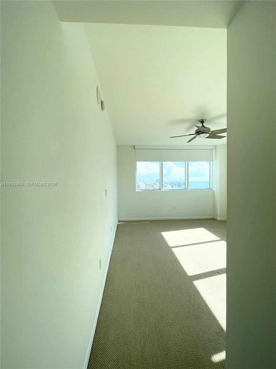 253 Northeast 2nd Street, Unit 2409 Miami, FL 33132 - Photo 38 of 61 a view of an empty room and window