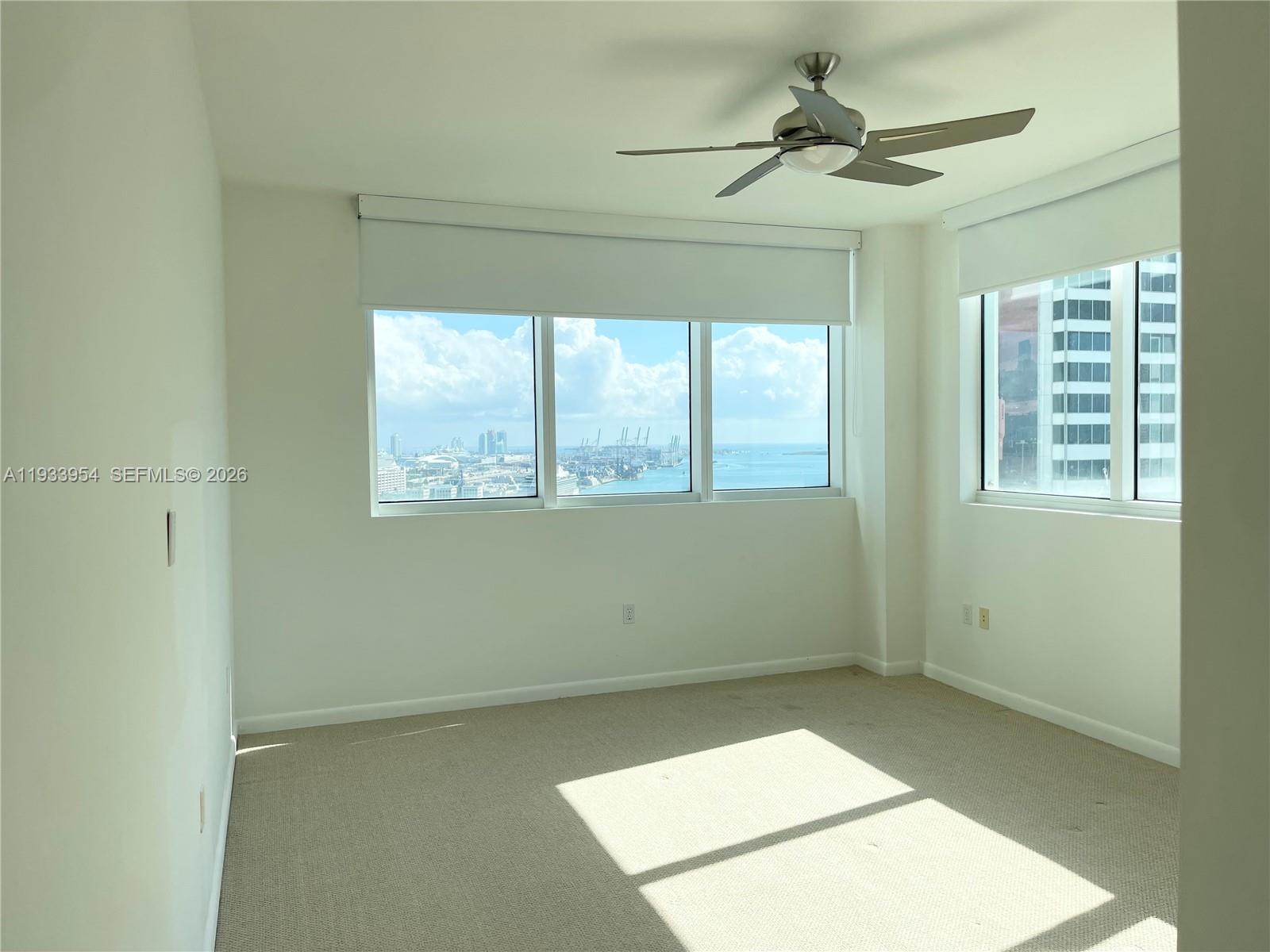 253 Northeast 2nd Street, Unit 2409 Miami, FL 33132 - Photo 40 of 61 a view of an empty room with a window