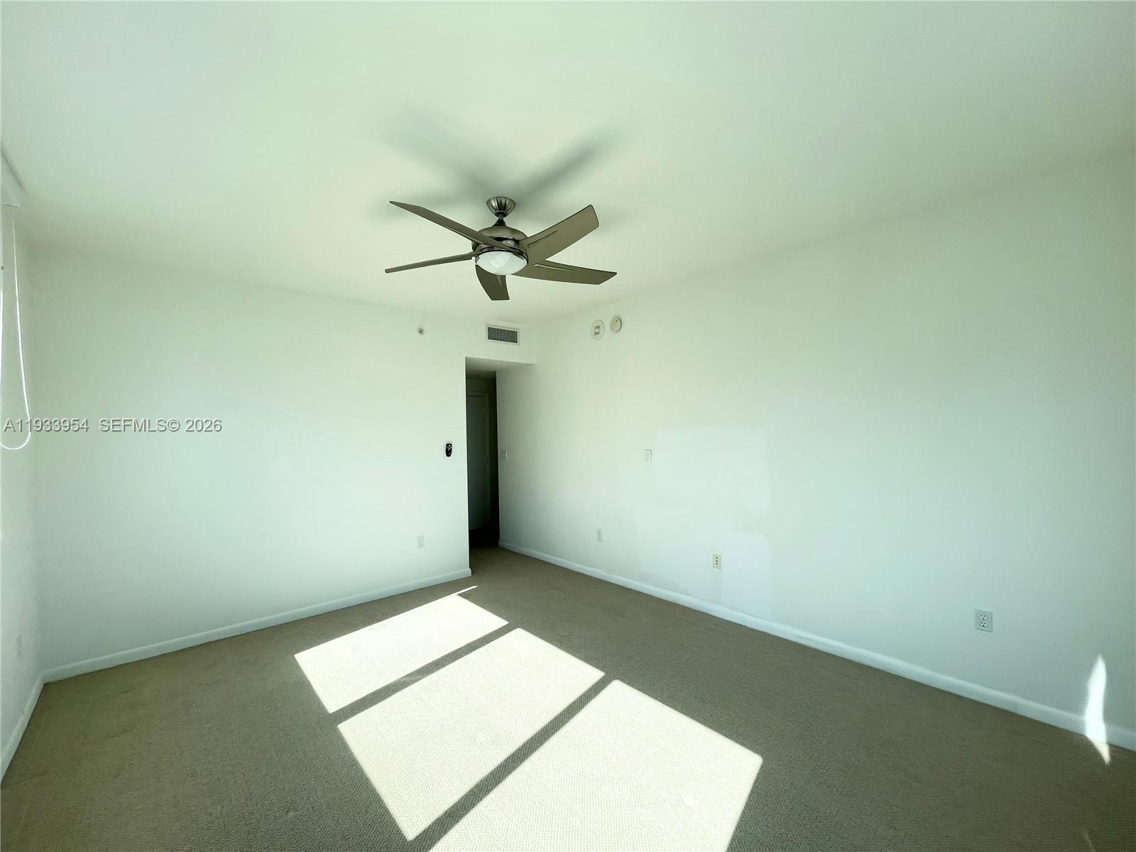253 Northeast 2nd Street, Unit 2409 Miami, FL 33132 - Photo 45 of 61 an empty room with a window