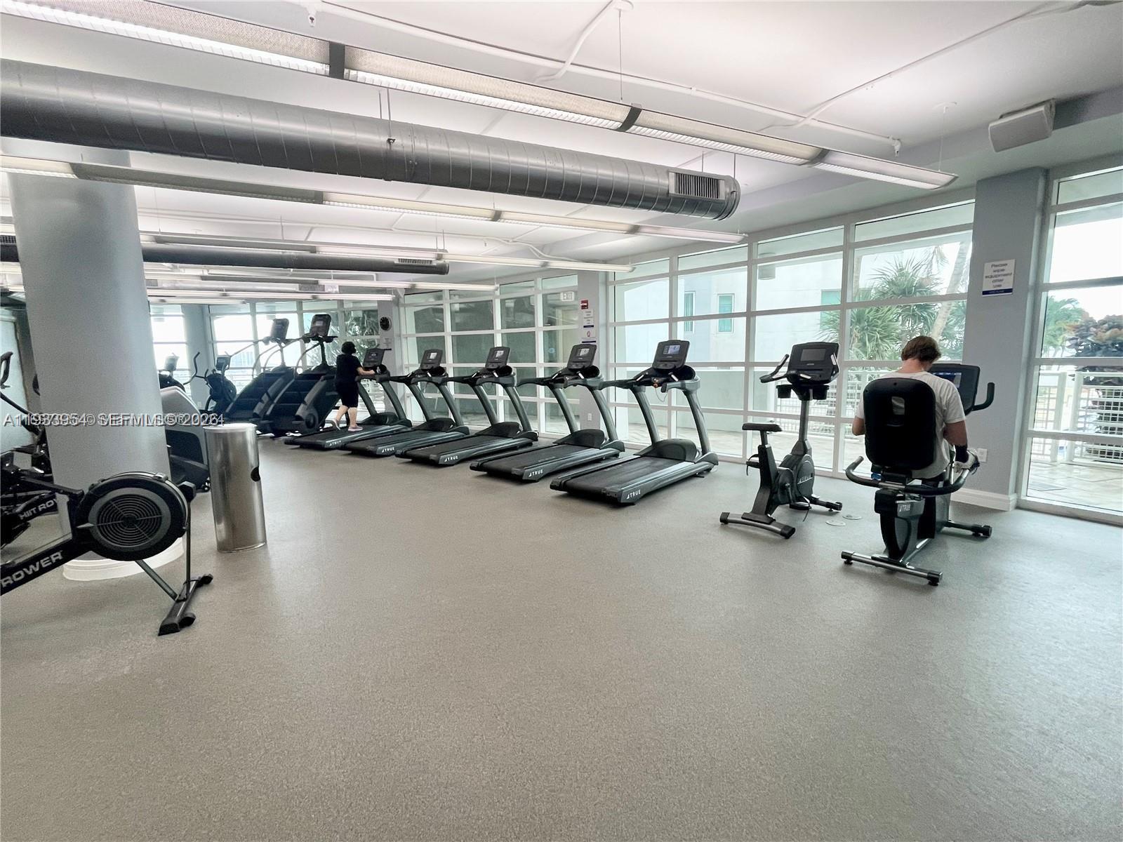253 Northeast 2nd Street, Unit 2409 Miami, FL 33132 - Photo 53 of 61 a view of a room with gym equipment