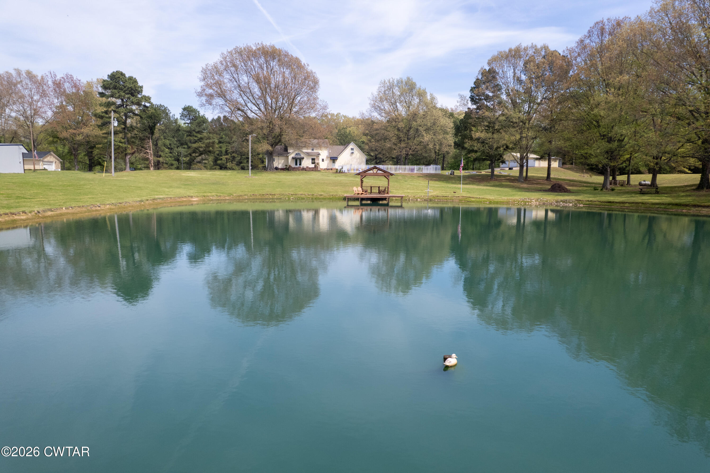 2757 Edward Williams Road Gadsden, TN 38337 - Photo 11 of 51 a view of a lake with houses