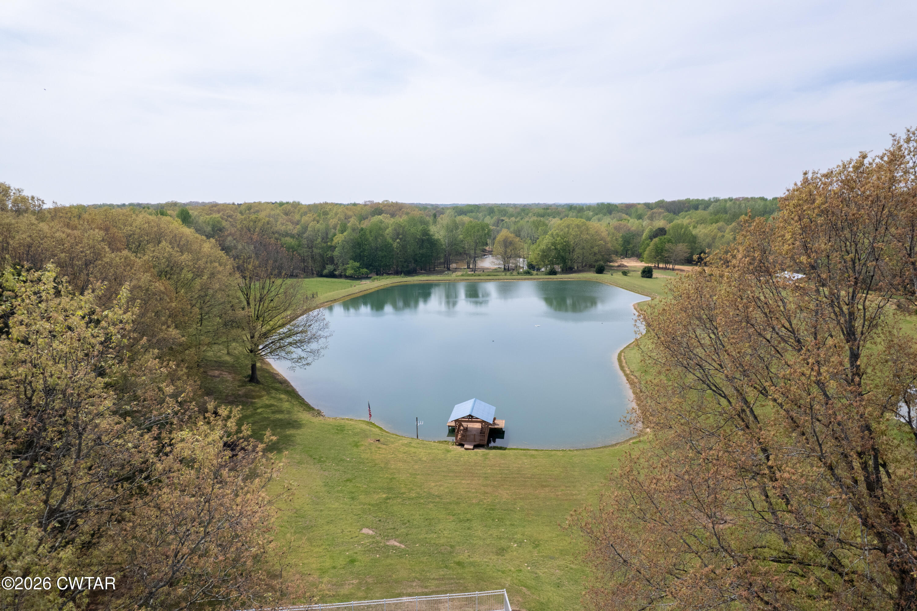 2757 Edward Williams Road Gadsden, TN 38337 - Photo 16 of 51 a view of a lake with a mountain