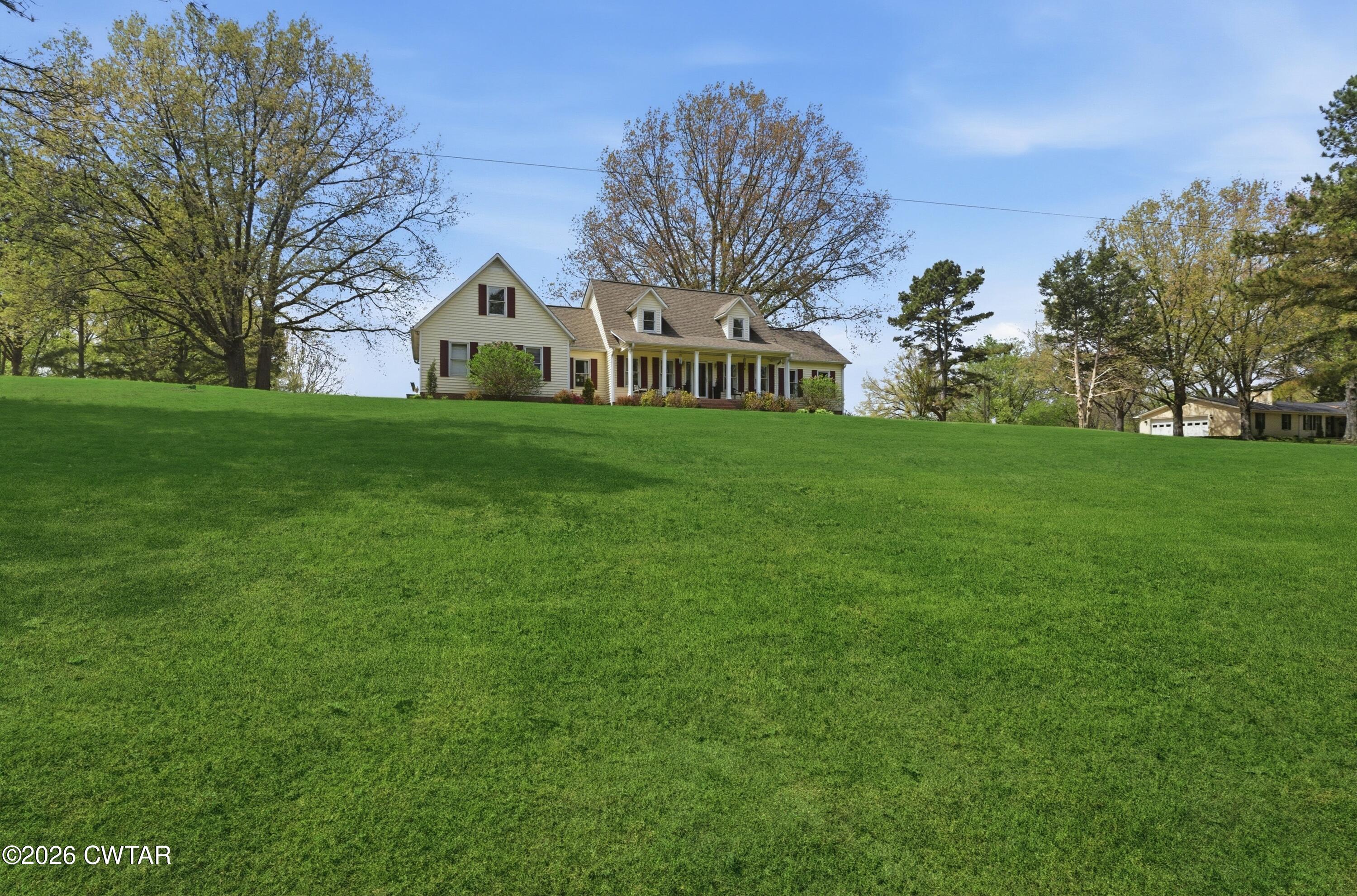 2757 Edward Williams Road Gadsden, TN 38337 - Photo 2 of 51 a view of a green field near a tree