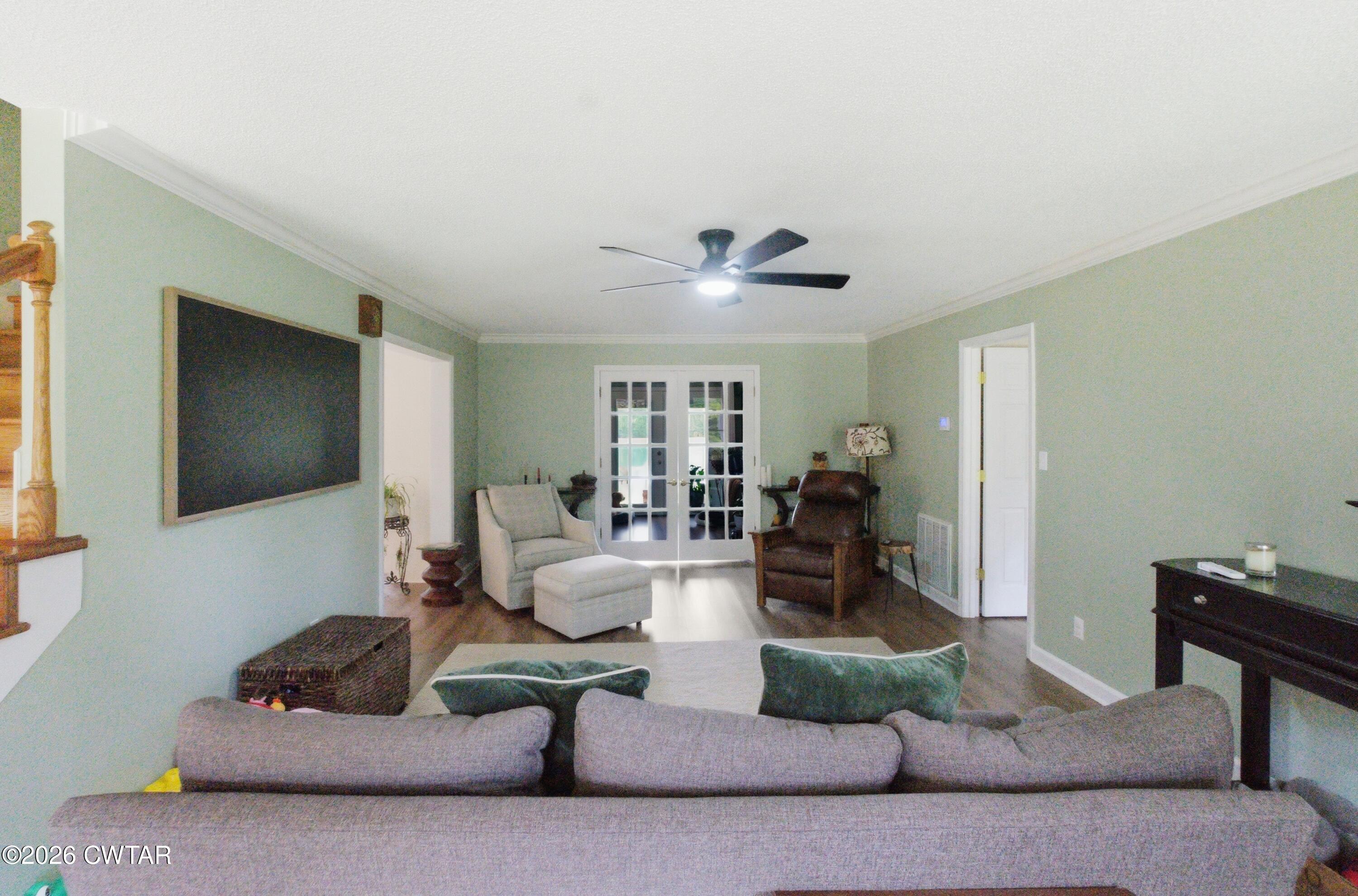 2757 Edward Williams Road Gadsden, TN 38337 - Photo 21 of 51 a living room with furniture and a flat screen tv