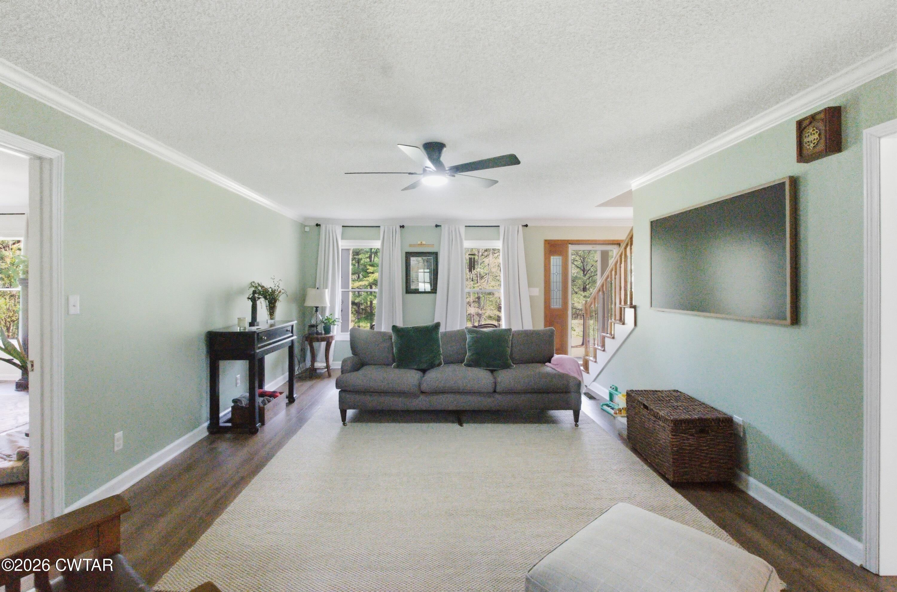 2757 Edward Williams Road Gadsden, TN 38337 - Photo 22 of 51 a living room with furniture and a flat screen tv