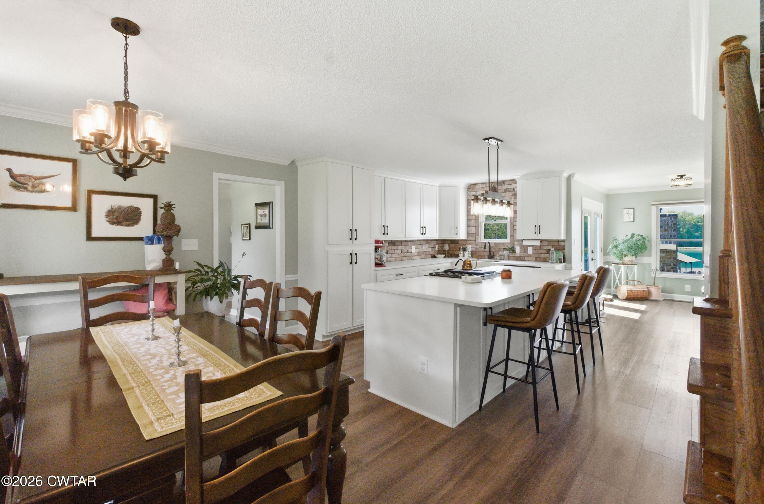 2757 Edward Williams Road Gadsden, TN 38337 - Photo 23 of 51 a view of a dining room with furniture and wooden floor