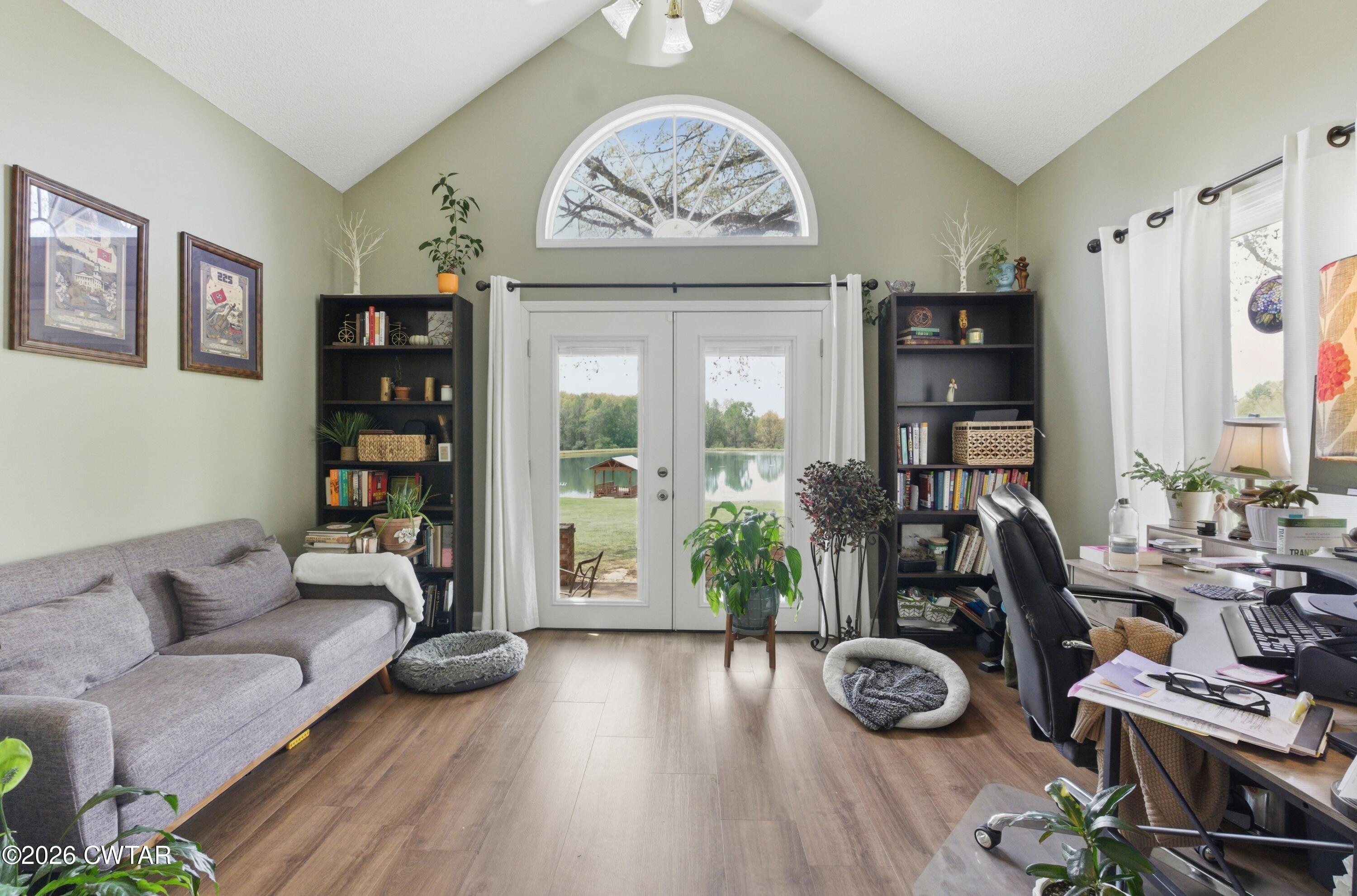 2757 Edward Williams Road Gadsden, TN 38337 - Photo 32 of 51 a view of a room with furniture and wooden floor