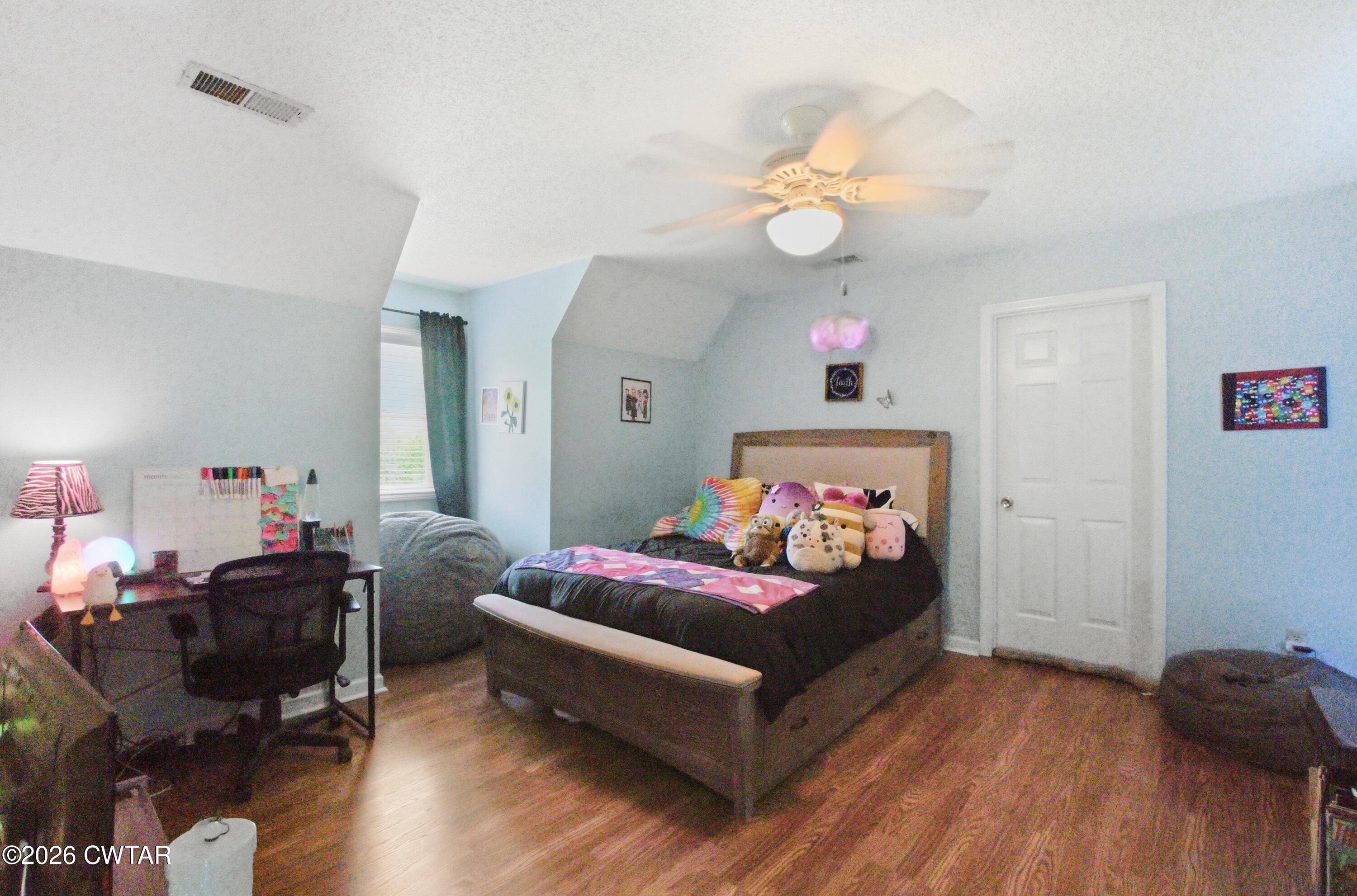 2757 Edward Williams Road Gadsden, TN 38337 - Photo 38 of 51 a bed room with a bed window and a chair