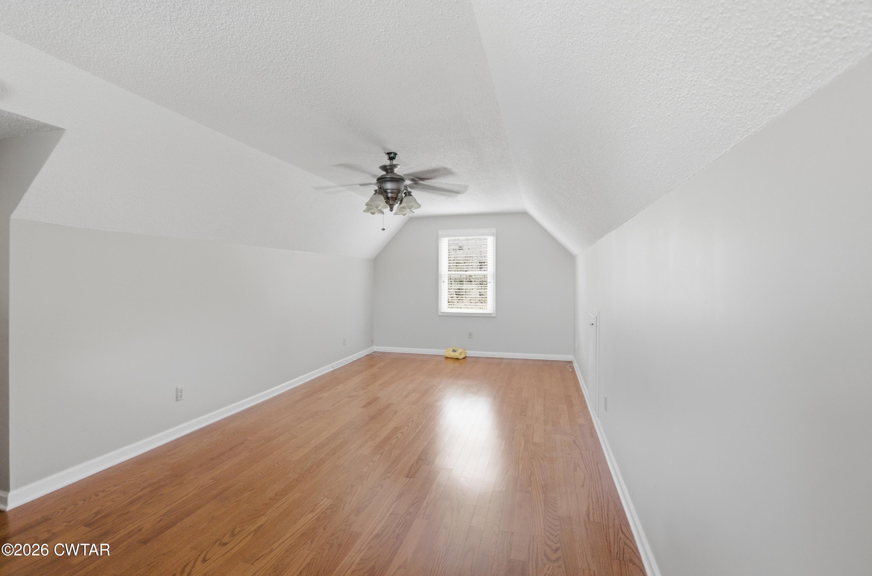 2757 Edward Williams Road Gadsden, TN 38337 - Photo 39 of 51 an empty room that has a workspace
