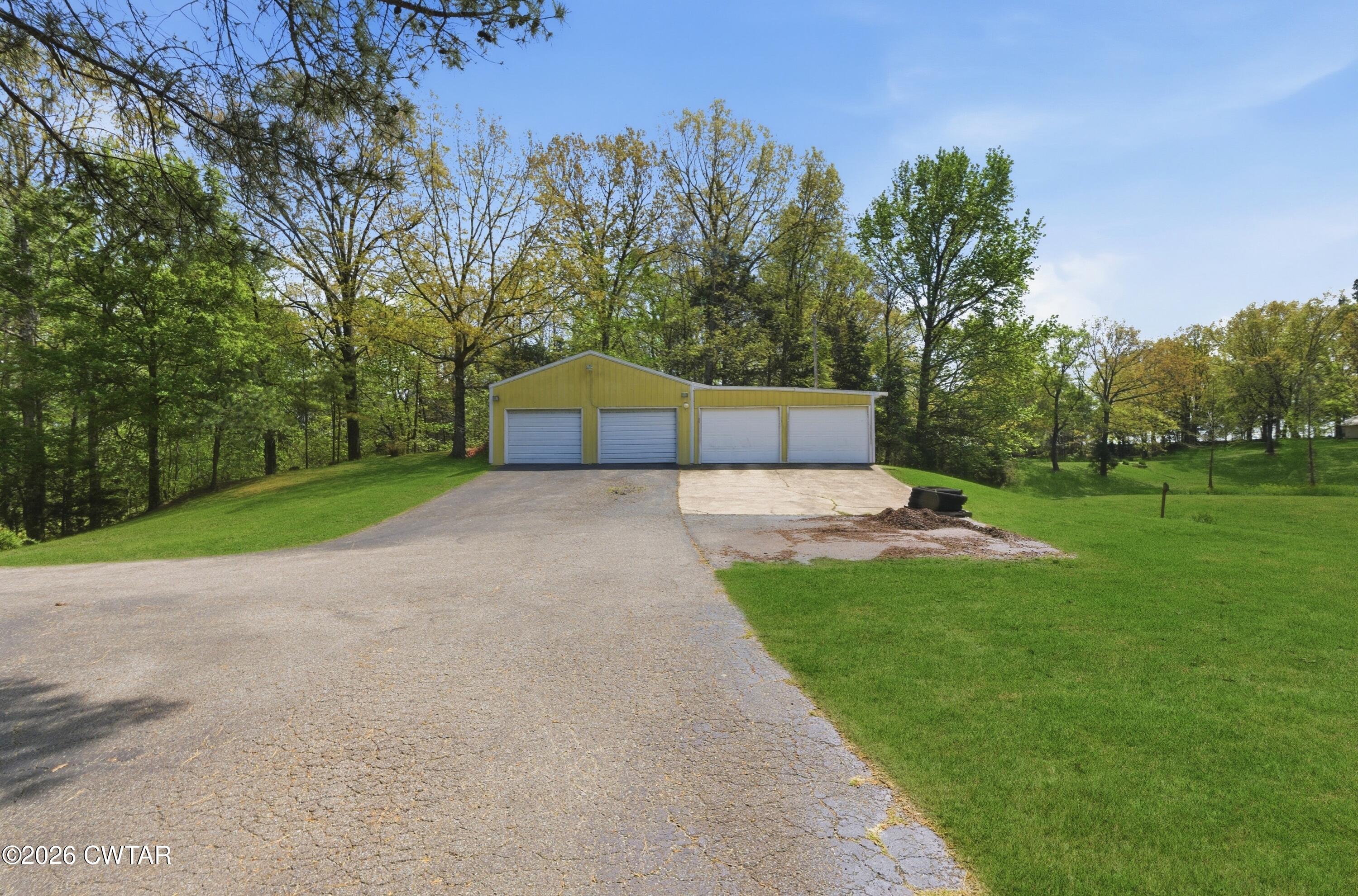 2757 Edward Williams Road Gadsden, TN 38337 - Photo 4 of 51 a view of a back yard with green space