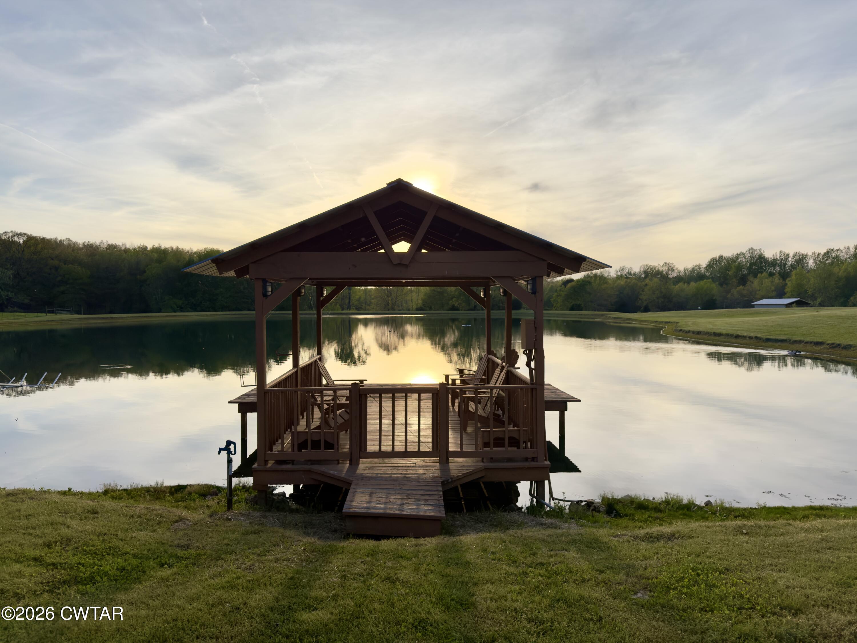 2757 Edward Williams Road Gadsden, TN 38337 - Photo 50 of 51 a view of a lake with a big yard