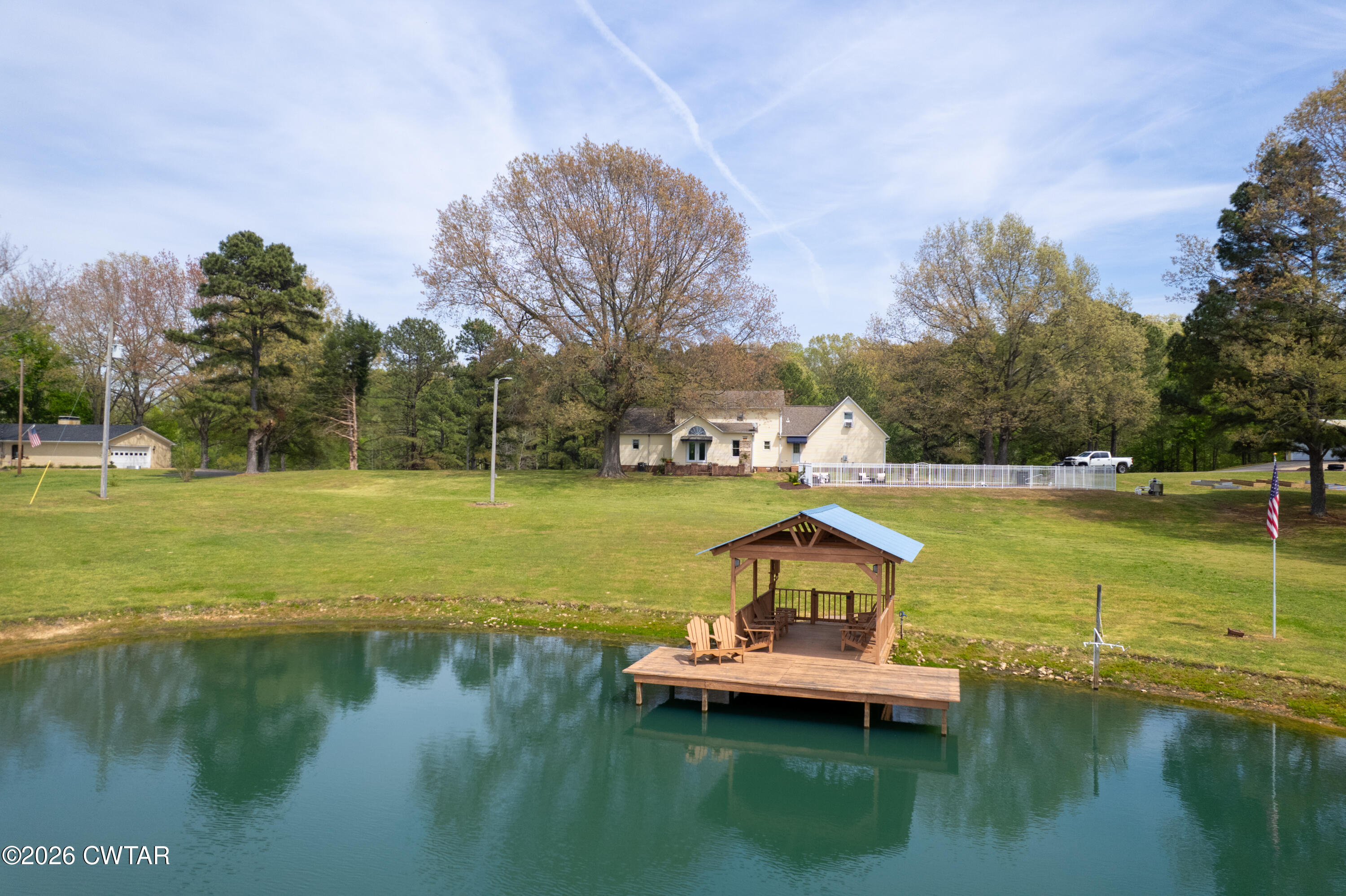 2757 Edward Williams Road Gadsden, TN 38337 - Photo 8 of 51 a view of a lake with houses