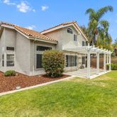 a view of a yard in front of house