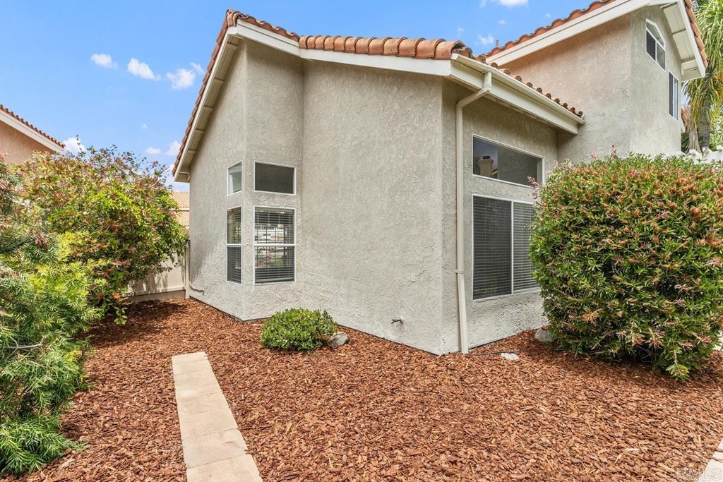1865 Ithaca Drive Vista, CA 92081 - Photo 28 of 31 a view of a house with a yard