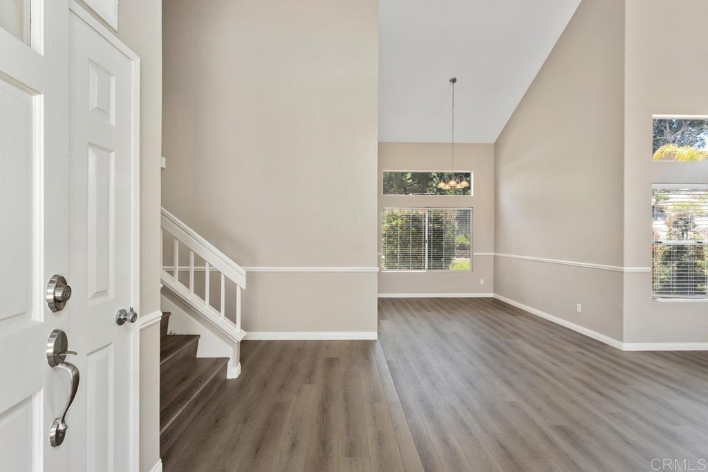 1865 Ithaca Drive Vista, CA 92081 - Photo 5 of 31 a view of entryway with wooden floor