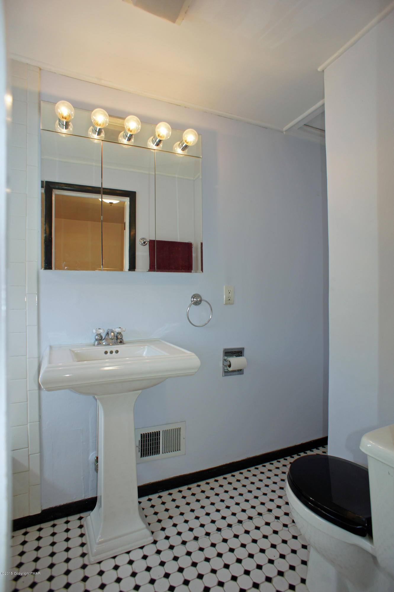 177 Tanite Road Stroudsburg, PA 18360 - Photo 18 of 30 a bathroom with a sink a toilet and mirror