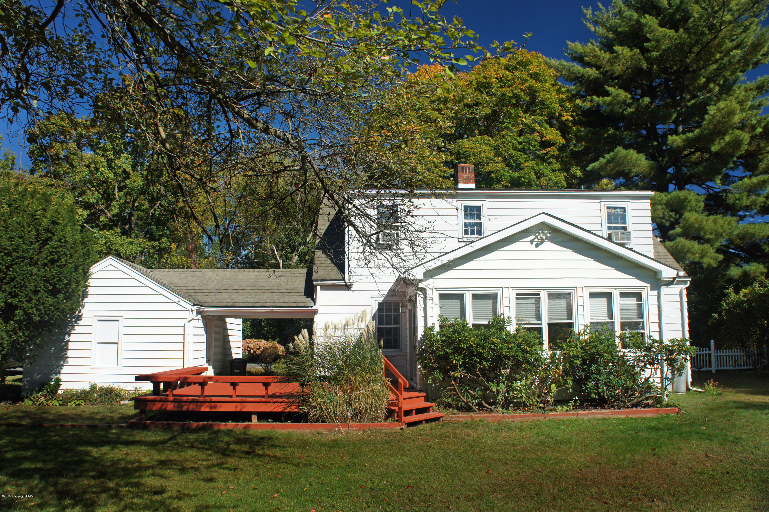 177 Tanite Road Stroudsburg, PA 18360 - Photo 30 of 30 a front view of a house with a yard table and chairs
