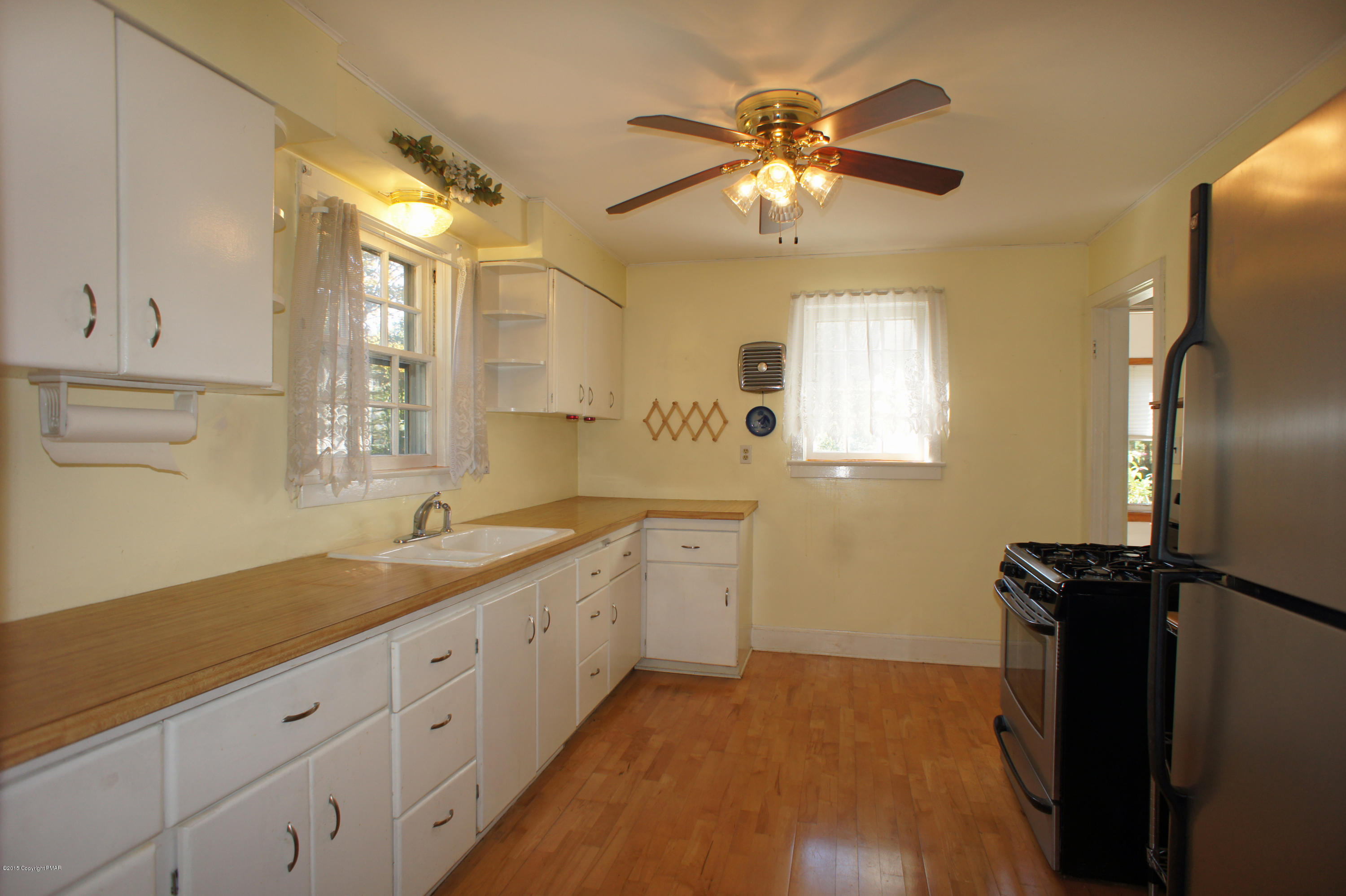 177 Tanite Road Stroudsburg, PA 18360 - Photo 4 of 30 a kitchen with sink cabinets and window