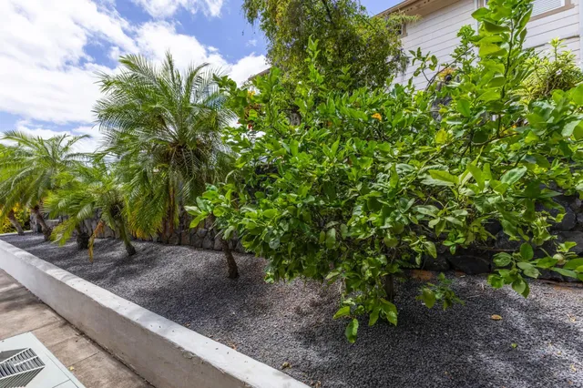 a view of a balcony with wooden floor and city view