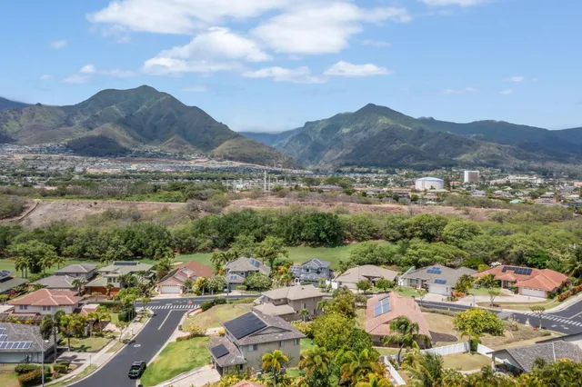 an aerial view of residential building and parking space