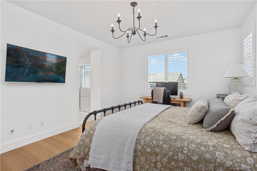 32207 Penstemon Way Temecula, CA 92591 - Photo 17 of 33 a bedroom with a bed and a flat screen tv