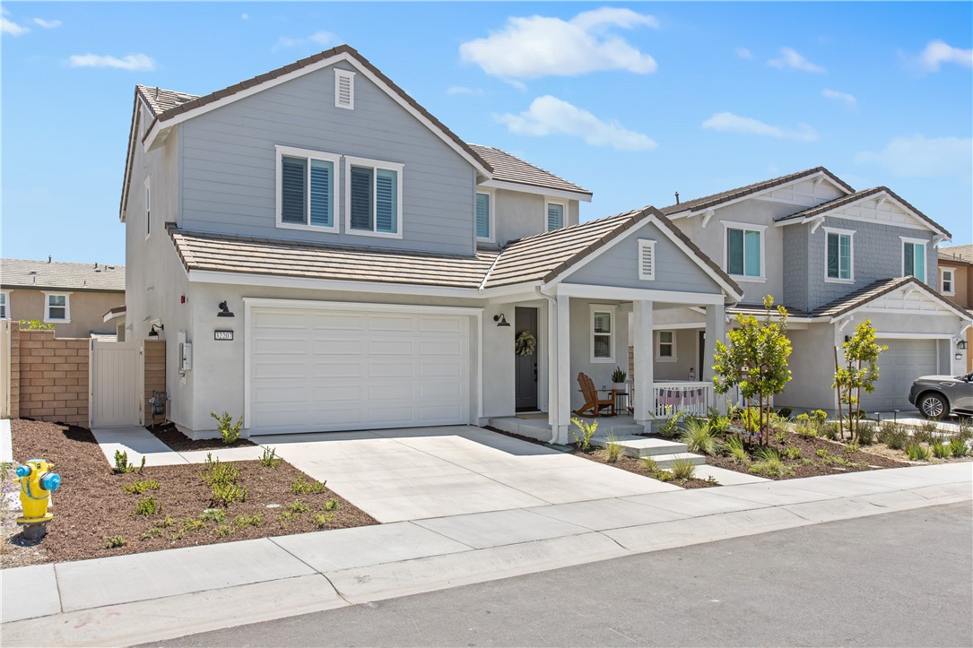 32207 Penstemon Way Temecula, CA 92591 - Photo 22 of 33 a front view of a house with a yard