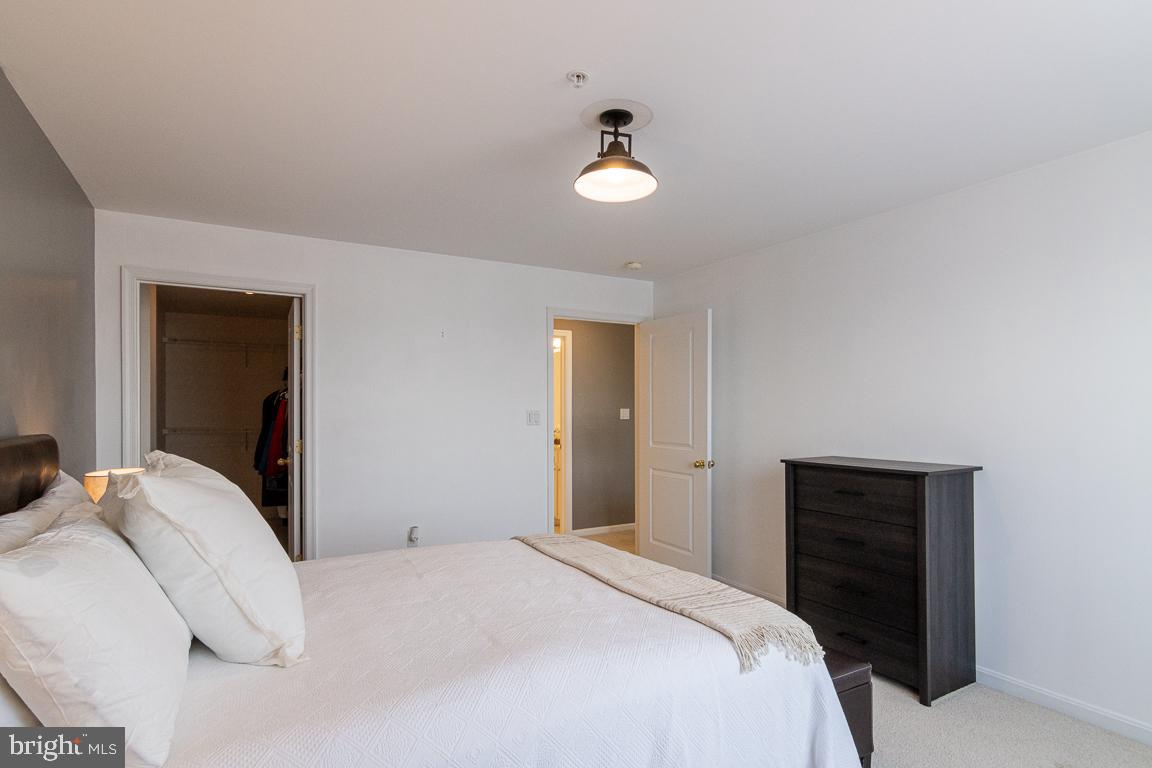 4800 Coyle Road, Unit 506 Owings Mills, MD 21117 - Photo 9 of 24 Bedroom with Large Walk-in Closet