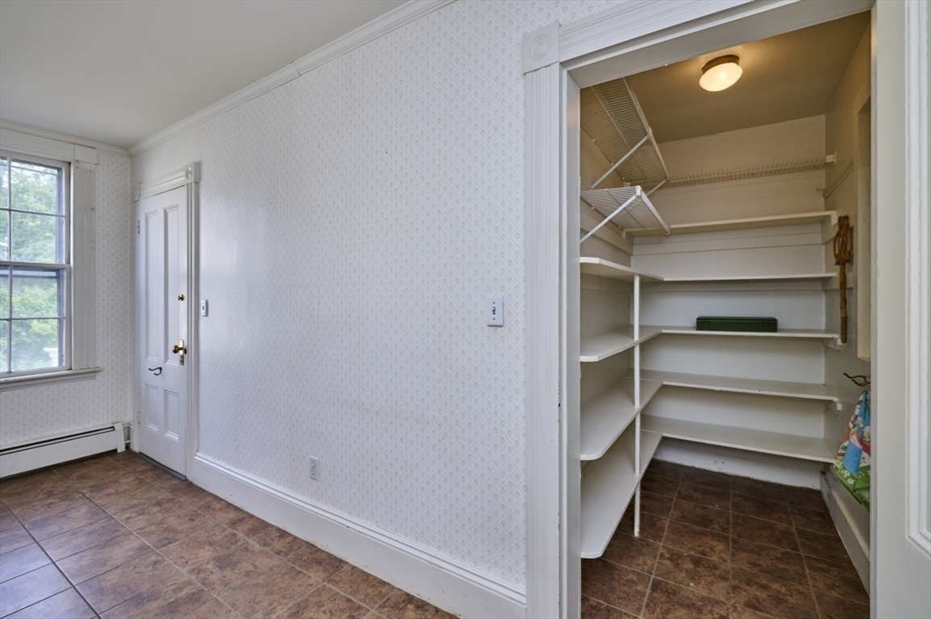 74 Washington Square, Unit 2 Salem, MA 01970 - Photo 13 of 31 a view of an empty room with a window