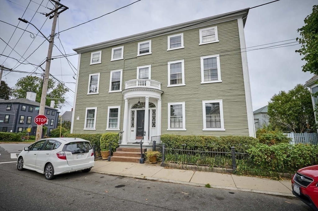 74 Washington Square, Unit 2 Salem, MA 01970 - Photo 23 of 31 a white car parked in front of a building