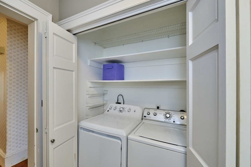 74 Washington Square, Unit 2 Salem, MA 01970 - Photo 5 of 31 a view of storage and utility room with washer and dryer