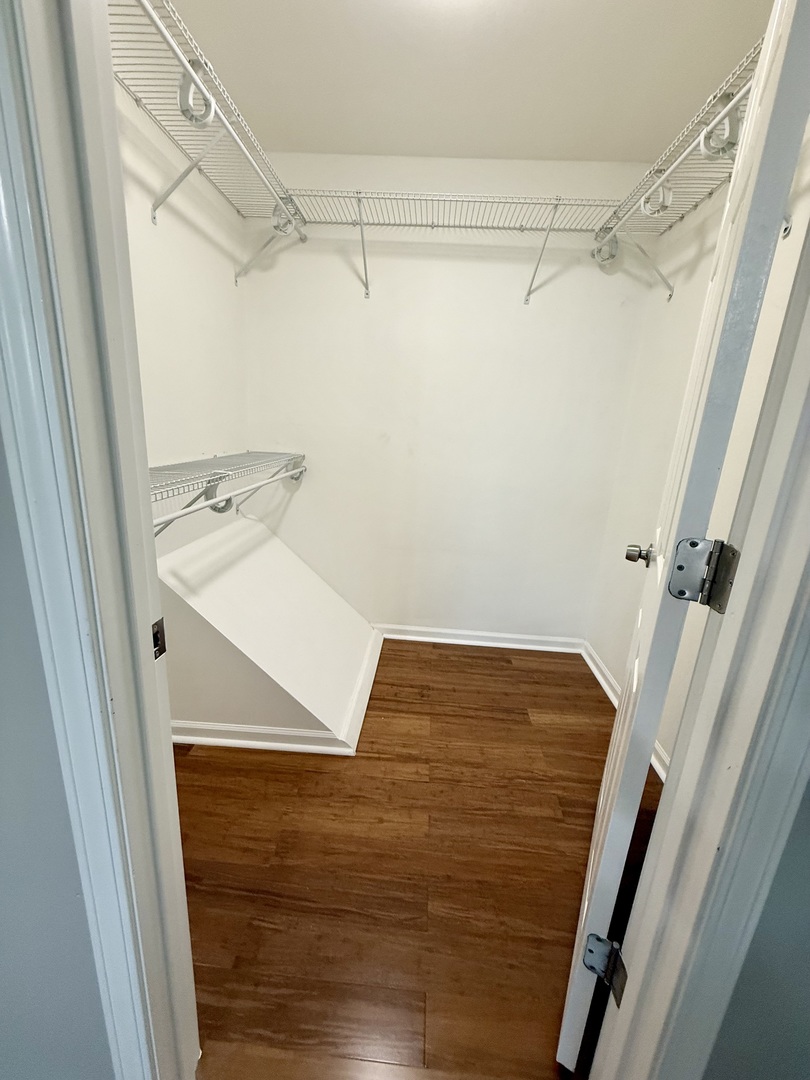 1045 Hampton Harbor, Unit 1045 Schaumburg, IL 60193 - Photo 11 of 18 a bathroom with a sink and shower