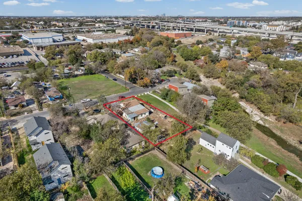 an aerial view of a house with outdoor space
