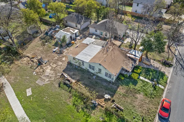 an aerial view of residential house with outdoor space