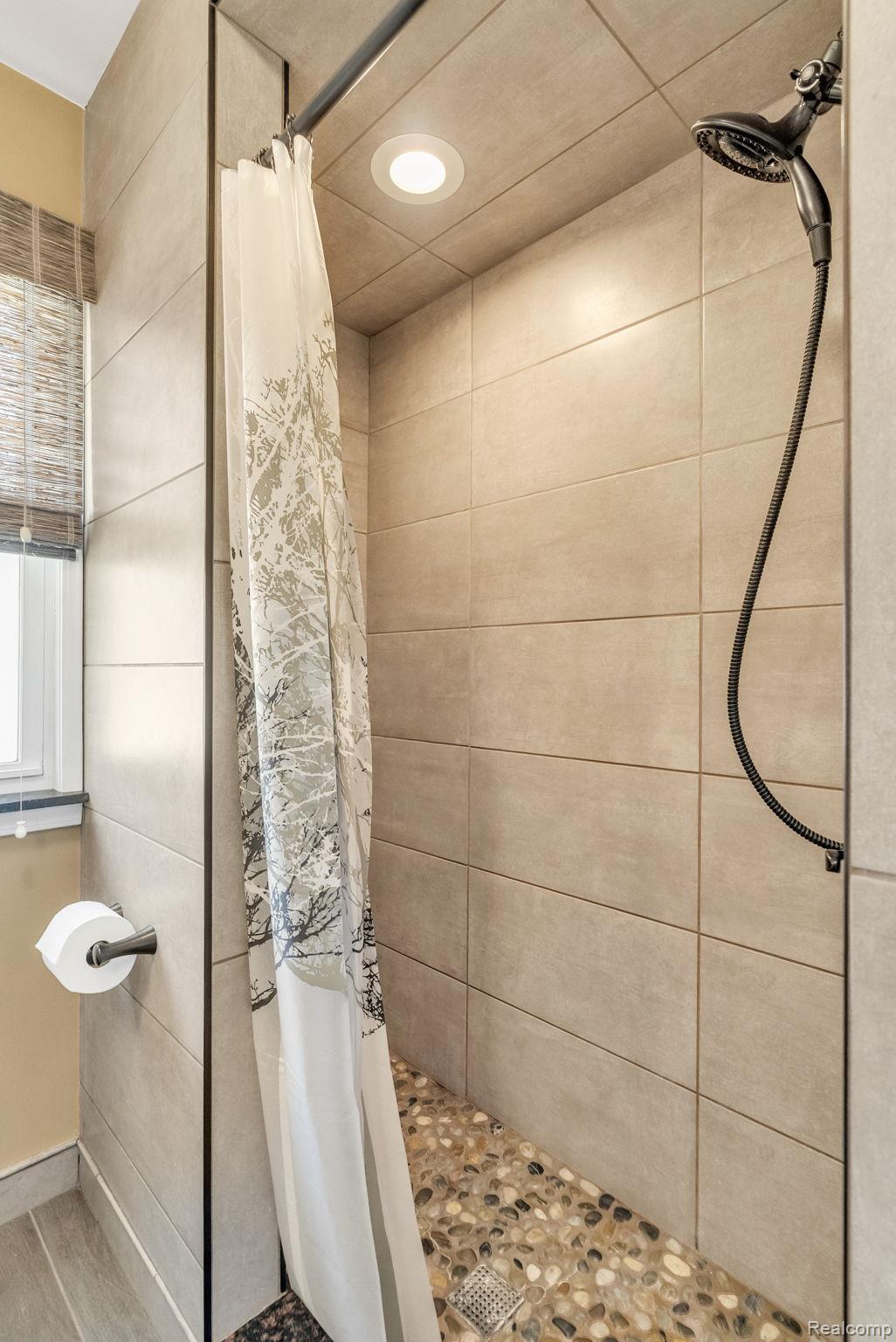 1020 Capac Road Allenton, MI 48002 - Photo 24 of 36 Bathroom with a shower stall and recessed lighting