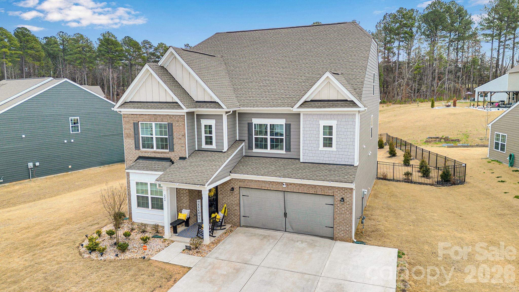 224 Hamptons Cove Road Troutman, NC 28166 - Photo 2 of 47 a view of a house with a outdoor space