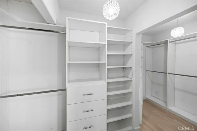 a view of an empty walk in closet