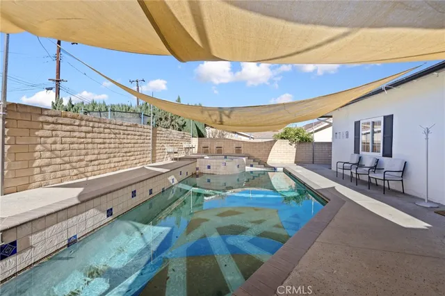 a view of a balcony with chairs