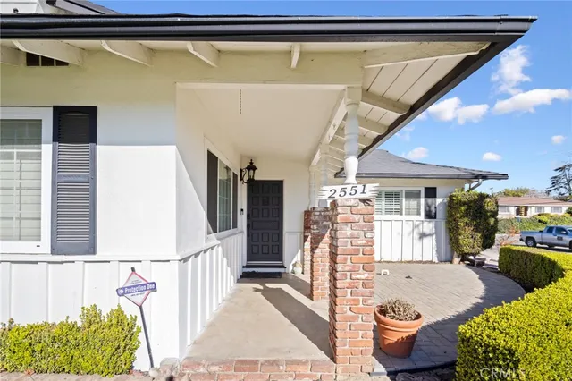 a outdoor space with swimming pool and furniture