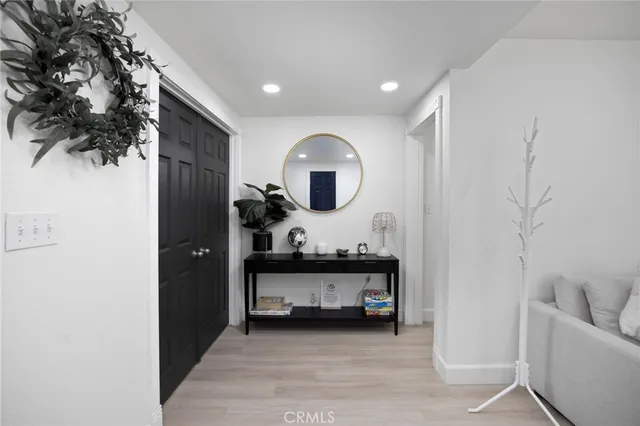 a view of living room with furniture and window