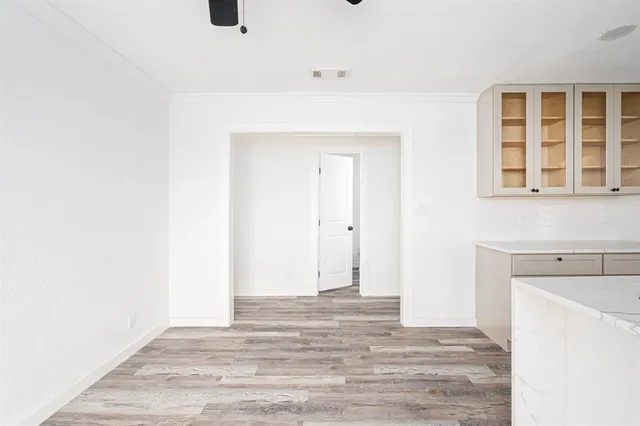 a view of a livingroom with wooden floor