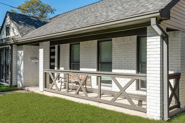 a black and white house with outdoor space