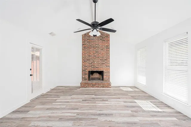 a view of a livingroom with a fireplace