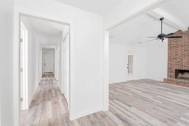 a view of a bedroom from the hallway