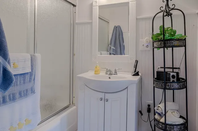 a room with furniture and a flat screen tv