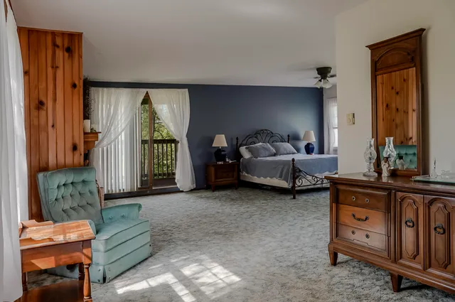 a view of a hallway with a white walls